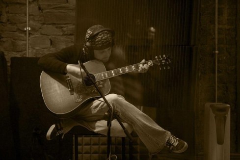 Evora Alan Sitting on Amp